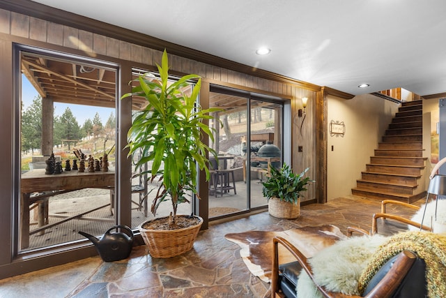 16485 Folsom Rd, Florence, MT 59833 - building lobby with wooden walls, ornamental molding, stairs, and recessed lighting