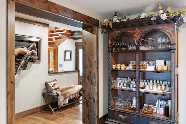 16485 Folsom Rd, Florence, MT 59833 - bar area featuring wood finished floors and baseboards