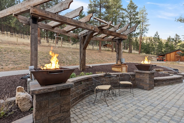16485 Folsom Rd, Florence, MT 59833 - view of patio with an outdoor fire pit