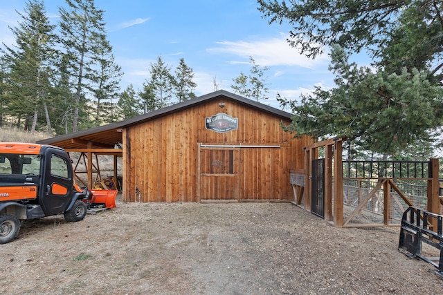 16485 Folsom Rd, Florence, MT 59833 - view of outdoor structure with fence and a gate