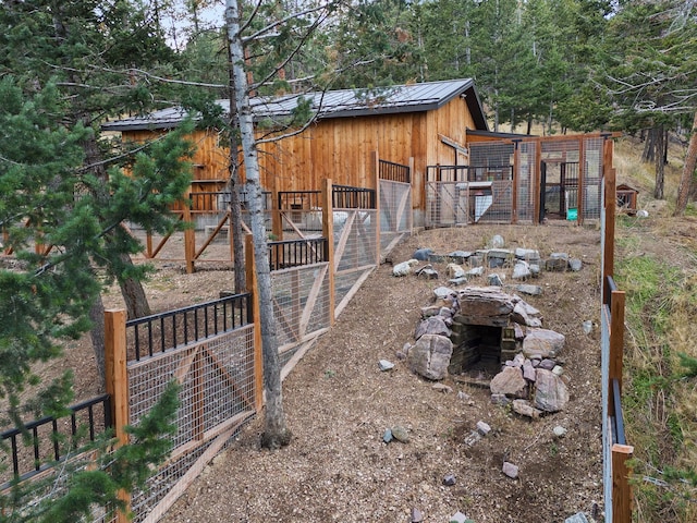 16485 Folsom Rd, Florence, MT 59833 - view of yard with an outdoor structure and an exterior structure