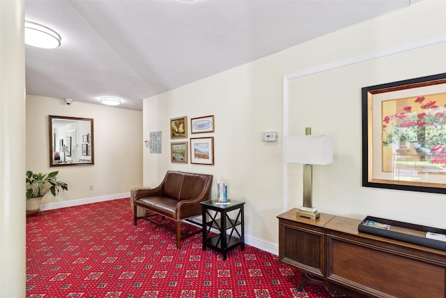 living area with carpet floors