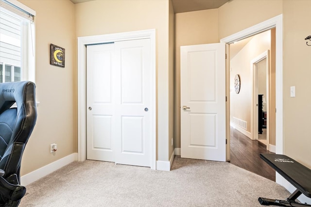 view of carpeted home office