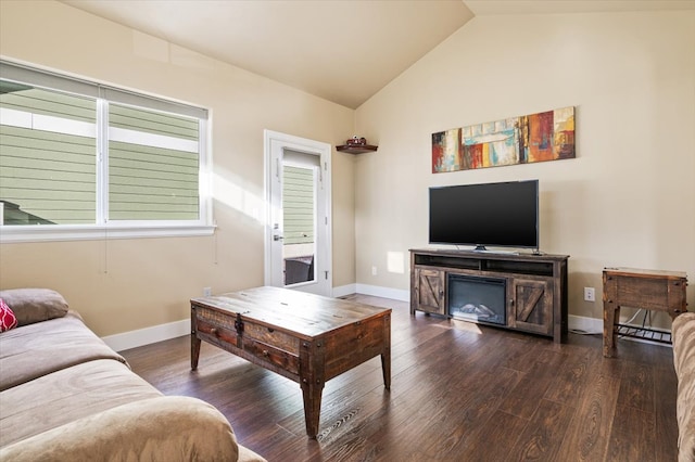 living room featuring dark wood-type flooring and lofted ceiling