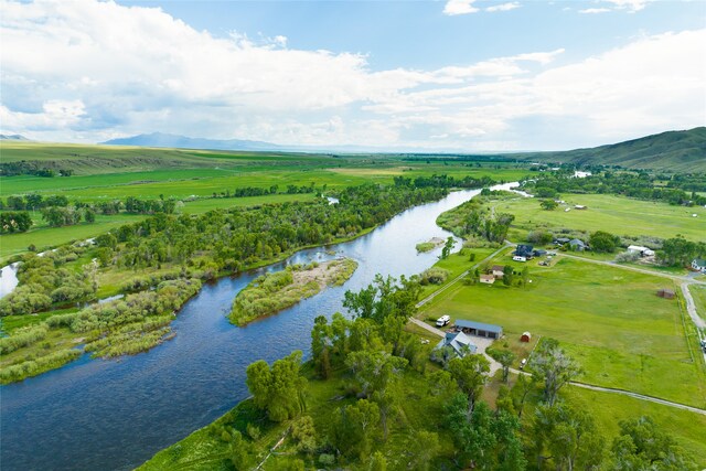 bird's eye view featuring a water and mountain view and a rural view