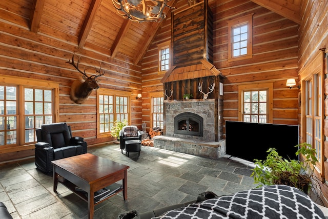 living room featuring a fireplace, high vaulted ceiling, beam ceiling, a notable chandelier, and wood ceiling