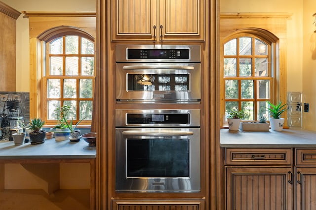 kitchen with stainless steel double oven