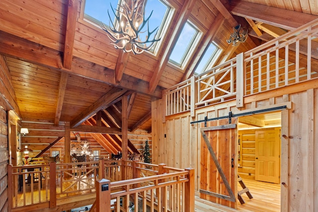 hall featuring beam ceiling, hardwood / wood-style flooring, and wood ceiling