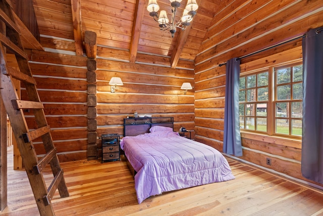 unfurnished bedroom featuring light hardwood / wood-style flooring, vaulted ceiling with beams, wood ceiling, and a chandelier