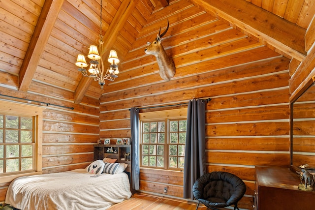 bedroom featuring hardwood / wood-style flooring, wood ceiling, and multiple windows