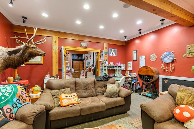 living room with beam ceiling and ornamental molding