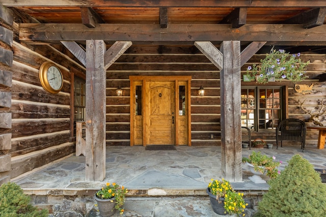 entrance to property with a porch