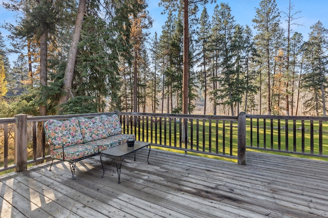 wooden terrace featuring an outdoor hangout area