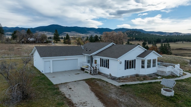 exterior space featuring a mountain view