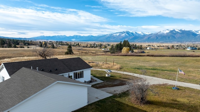 exterior space featuring a mountain view and a rural view