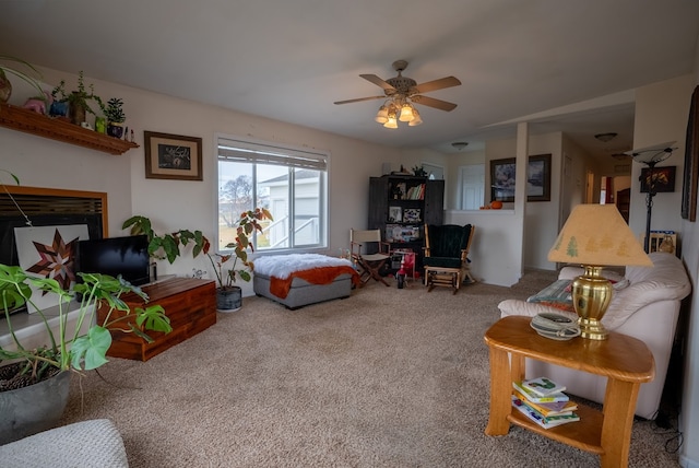 living room featuring carpet flooring and ceiling fan