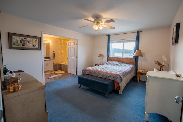 carpeted bedroom with connected bathroom and ceiling fan