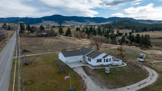 bird's eye view with a mountain view and a rural view