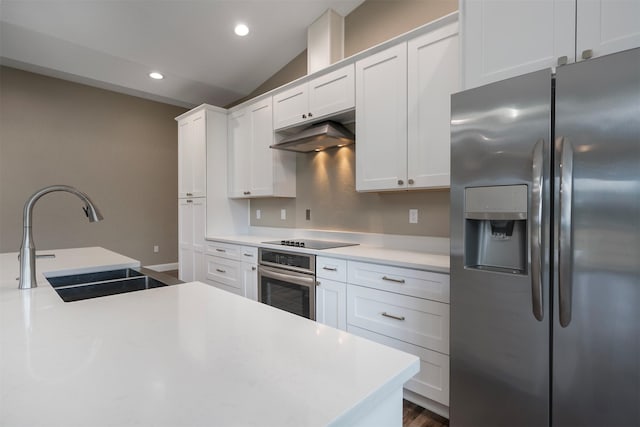 309 Kari Ln, Polson, MT 59860 - kitchen featuring stainless steel appliances, a sink, under cabinet range hood, light countertops, and white cabinetry