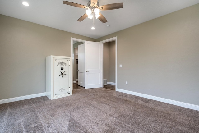309 Kari Ln, Polson, MT 59860 - unfurnished bedroom featuring carpet flooring, baseboards, recessed lighting, and a ceiling fan