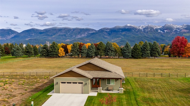 mountain view featuring a rural view