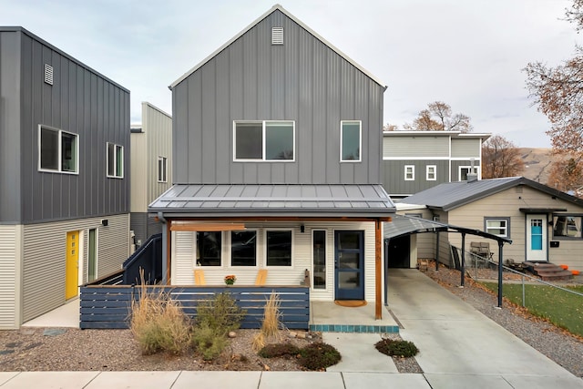 view of front of home featuring a carport