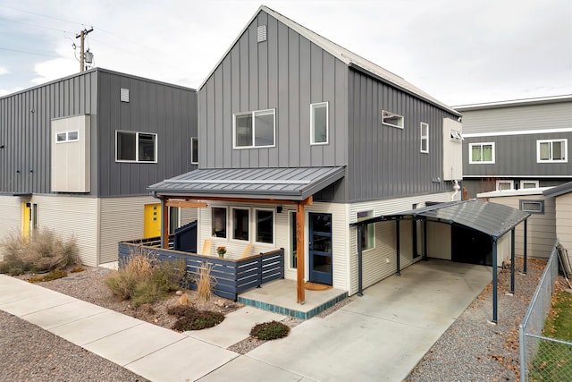 view of front of property with a carport