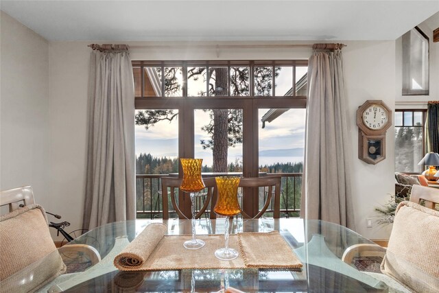 32054 Birch Tree Dr, Bigfork, MT 59911 - balcony featuring a wooded view