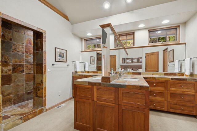 32054 Birch Tree Dr, Bigfork, MT 59911 - full bathroom featuring vanity, a tile shower, recessed lighting, and ornamental molding