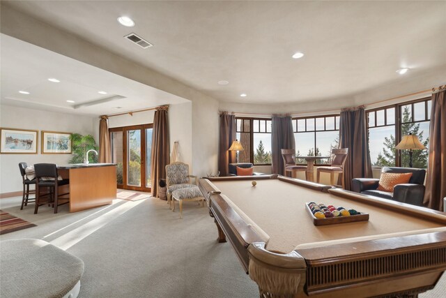 32054 Birch Tree Dr, Bigfork, MT 59911 - rec room featuring carpet floors, billiards table, a glass covered fireplace, and recessed lighting