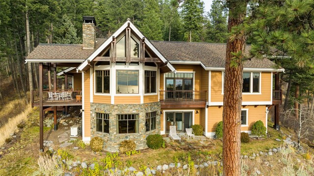 32054 Birch Tree Dr, Bigfork, MT 59911 - view of subject property with a heavily wooded area