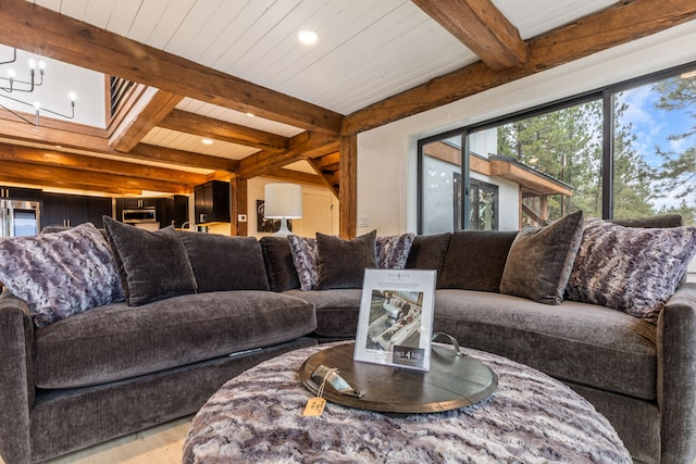 469 Owings Creek Loop, Hamilton, MT 59840 - living room featuring wood finished floors, beam ceiling, a chandelier, and recessed lighting