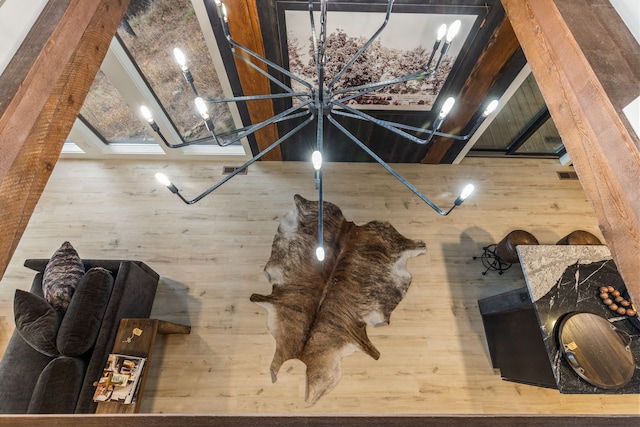 details with wood walls and wood-type flooring