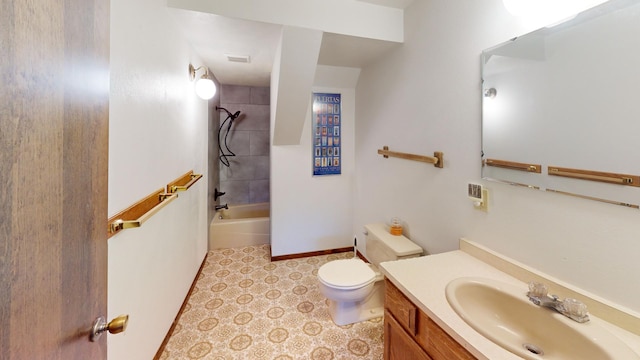 full bathroom featuring vanity, toilet, and tiled shower / bath combo