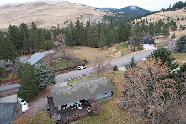 birds eye view of property with a mountain view