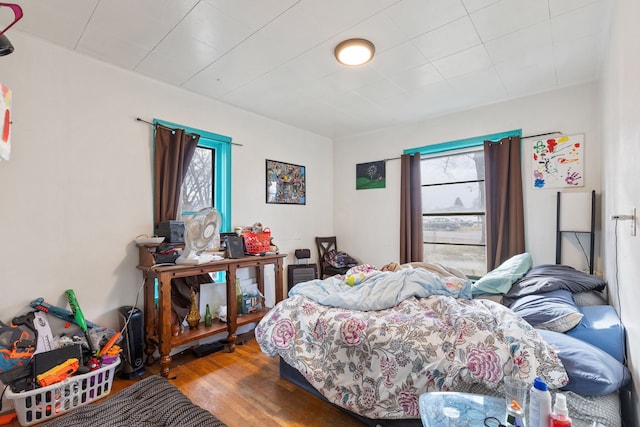 bedroom featuring hardwood / wood-style flooring