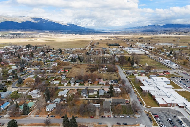 drone / aerial view featuring a mountain view