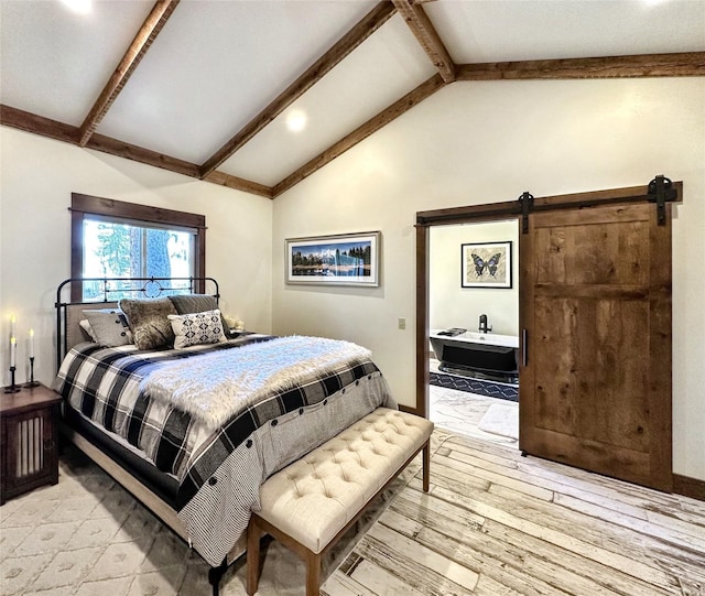 401 Mill St, Sheridan, MT 59749 - bedroom with light wood-style floors, a barn door, and recessed lighting
