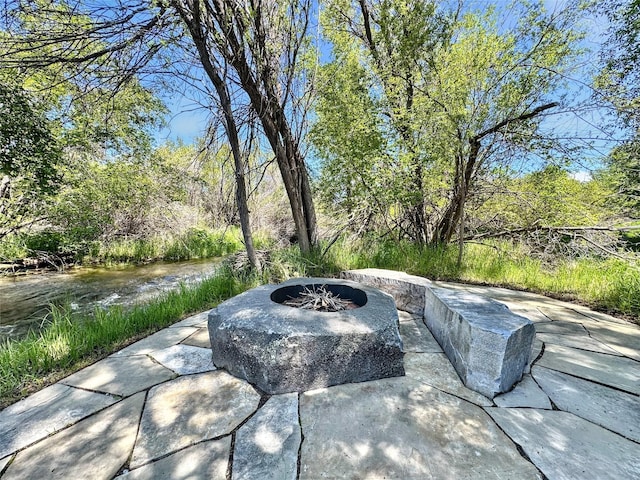 401 Mill St, Sheridan, MT 59749 - view of patio / terrace with an outdoor fire pit