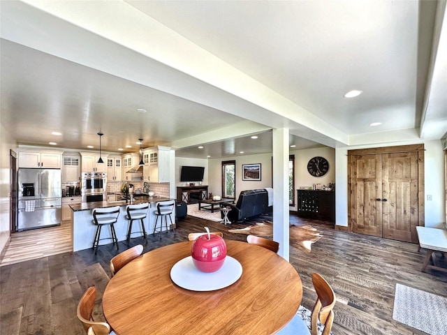 401 Mill St, Sheridan, MT 59749 - dining area featuring dark wood finished floors and recessed lighting