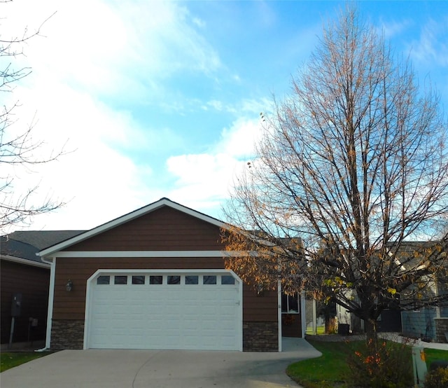 single story home with a garage