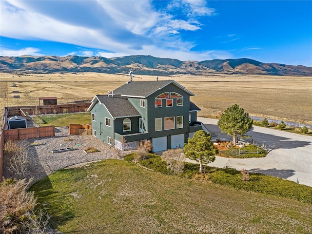 aerial view featuring a mountain view and a rural view