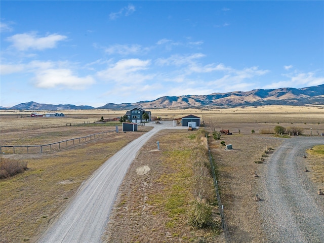 exterior space with a mountain view and a rural view