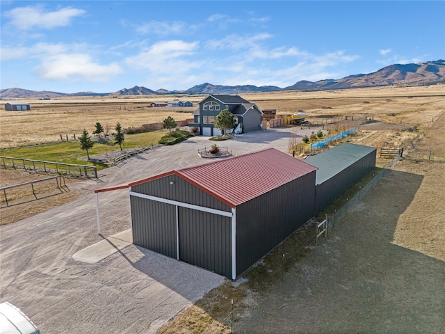 aerial view featuring a mountain view and a rural view