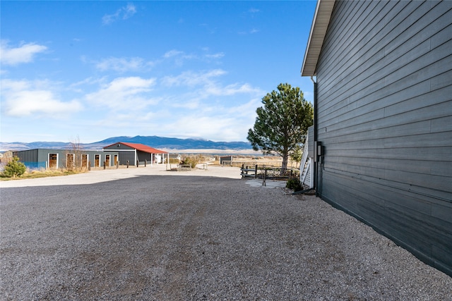 view of yard with a mountain view