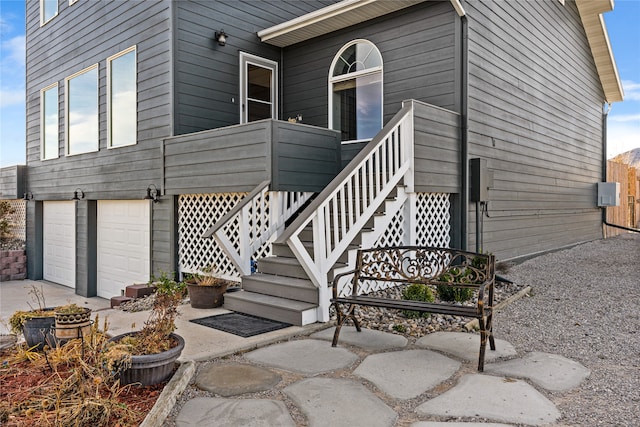 view of exterior entry featuring a garage