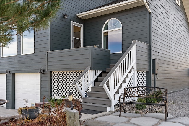 doorway to property featuring a garage