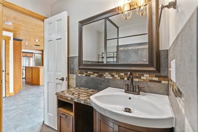 bathroom featuring sink and tile patterned flooring