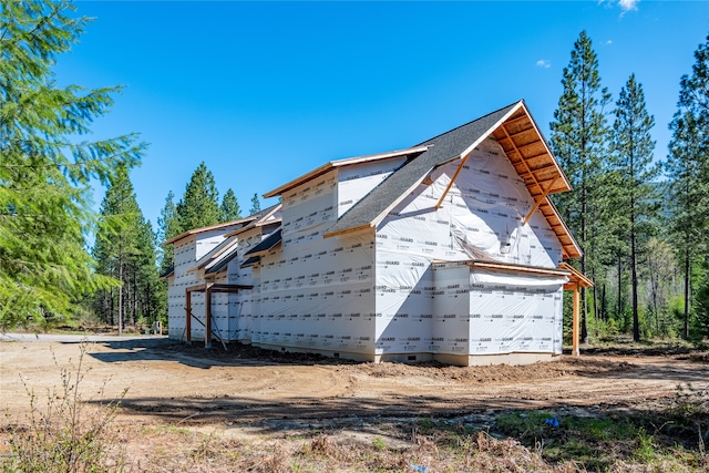 view of side of property with a garage