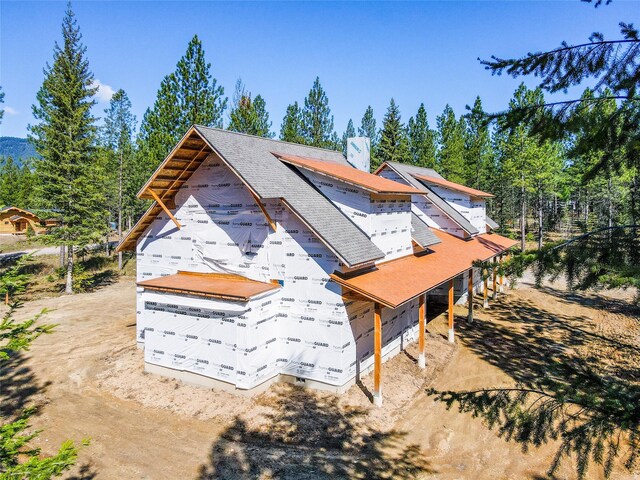 view of home's exterior featuring a mountain view